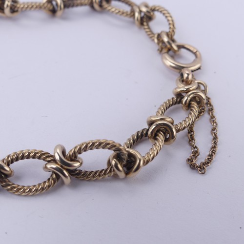 211 - A 9ct yellow gold Bracelet, formed of fourteen ropetwist links, with bolt ring clasp and safety chai... 