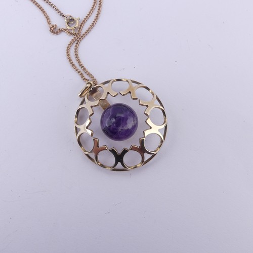 186 - A modernist amethyst 9ct gold Pendant, of open circular form with central cabochon amethyst, hallmar... 