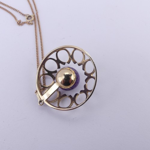 186 - A modernist amethyst 9ct gold Pendant, of open circular form with central cabochon amethyst, hallmar... 