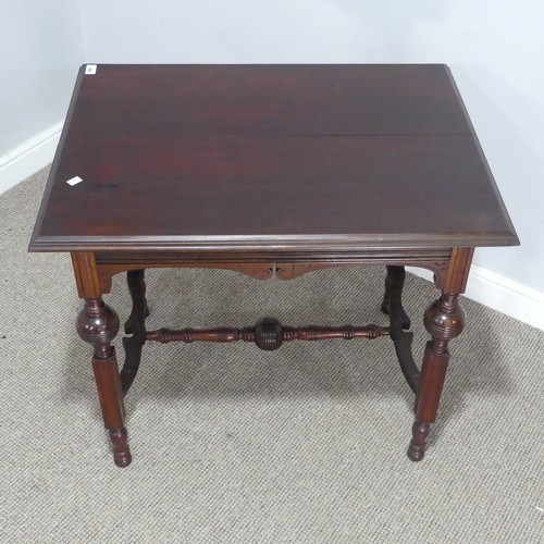 546 - An Aesthetic period mahogany Table, raised on four turned and reeded legs, united by 'H' stretcher, ... 