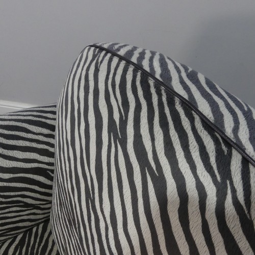 551 - A pair of Art Deco style upholstered Armchairs, with zebra pattern faux fur upholstery, W 98 cm x H ... 