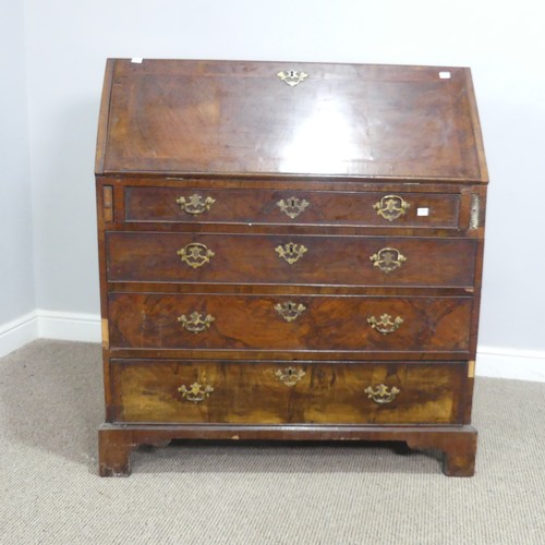 571 - A Georgian mahogany Bureau, with sloped fall front and fitted interior, raised on bracket feet, W 94... 