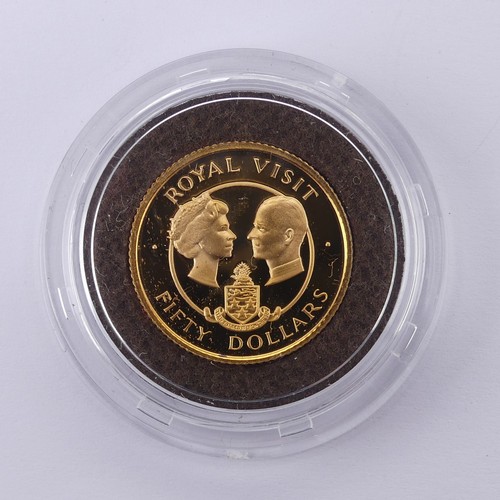 284 - A Cayman Islands Fifty Dollars gold Coin, to commemorate the Royal Visit on 1983, in Royal Mint pres... 