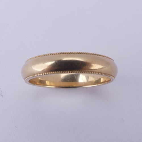 139 - A 14k yellow gold Band, by Birks, the inside marked '14k Birks F', with beaded rims, Size R½,... 