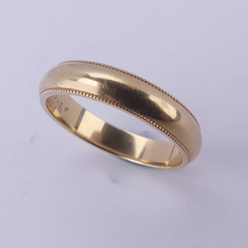 139 - A 14k yellow gold Band, by Birks, the inside marked '14k Birks F', with beaded rims, Size R½,... 