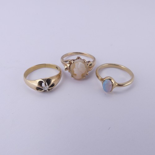 141 - A small 14k yellow gold Ring, with diamond point centre, Size I½, 2.6g, together with an opal... 