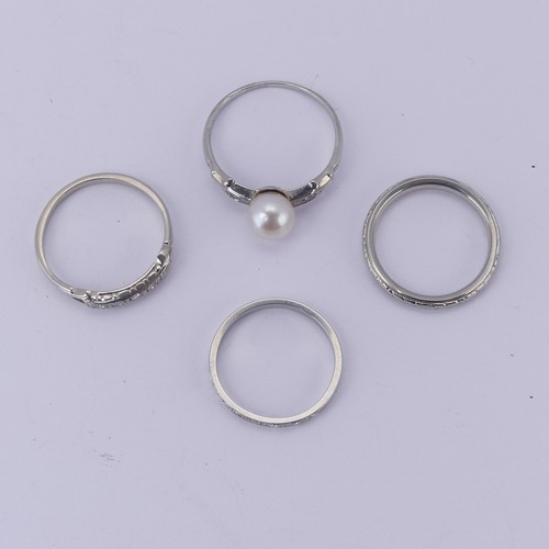 144 - Four 18ct white gold Rings; one set single cultured pearl with diamond points, Size M, one with five... 