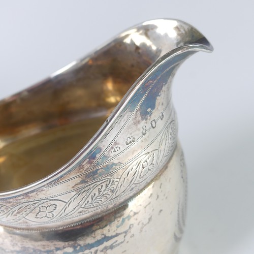 4 - A George III silver Cream Jug, by Dorothy Langlands, hallmarked Newcastle, no date letter, c.1810, o... 