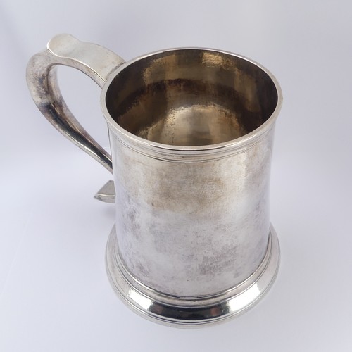 1 - A George II silver Mug, by John Langlands I, hallmarked Newcastle, 1757, of plain tapering form with... 