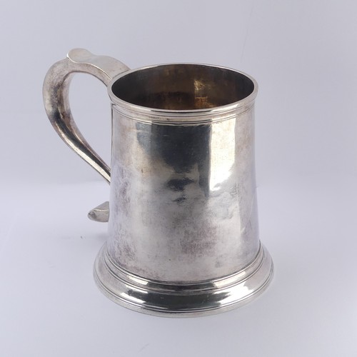 1 - A George II silver Mug, by John Langlands I, hallmarked Newcastle, 1757, of plain tapering form with... 