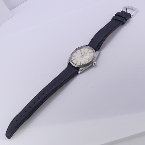 69 - A vintage Tudor Oysterdate stainless steel Wristwatch, the signed dial with baton markers and date a... 