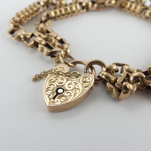 212 - A 9ct yellow and rose gold Bracelet, formed as a double row part watch chain, with 9ct gold padlock ... 