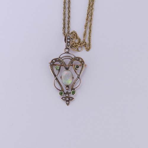 192 - An Art Nouveau opal Pendant, the central oval opal in scrolling open surround set demantoid garnets ... 