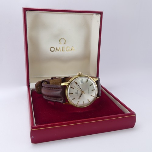 80 - An Omega Geneve gold plated Wristwatch, ref. 163.0098, the silvered dial with gilt baton markers and... 