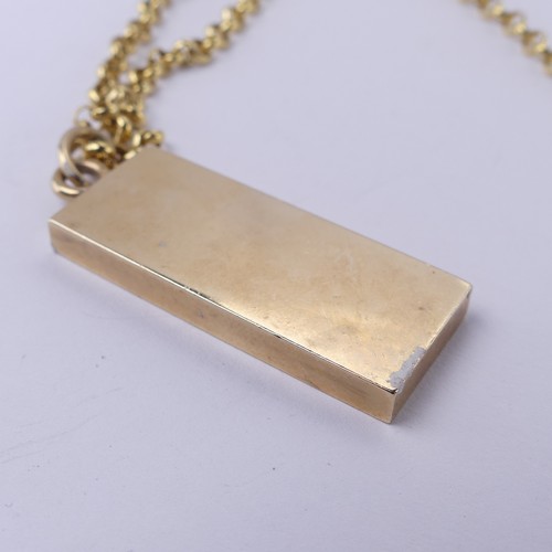 195 - A 9ct yellow gold Ingot Pendant, hallmarked Birmingham 1977, on a 9ct gold circular link chain, 49.5... 