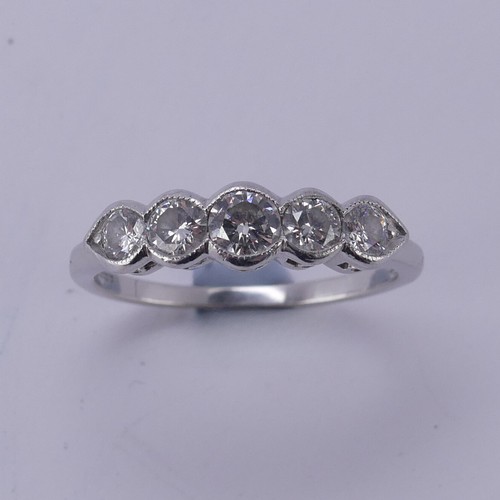 155 - A graduated five stone diamond Ring, total diamond weight approx. 0.56ct, all mounted in platinum, h... 