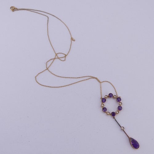 201 - An Edwardian amethyst and seed pearl Pendant, the open circular pendant with knife wire drop below s... 