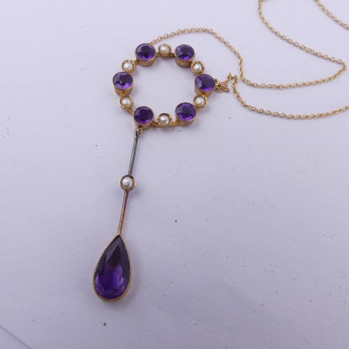 201 - An Edwardian amethyst and seed pearl Pendant, the open circular pendant with knife wire drop below s... 