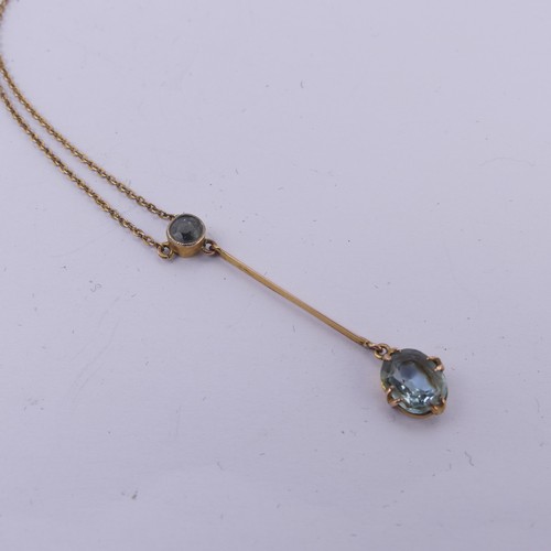 202 - An Edwardian aquamarine Pendant, with a millegrain set circular stone supending on a knifewire a cla... 