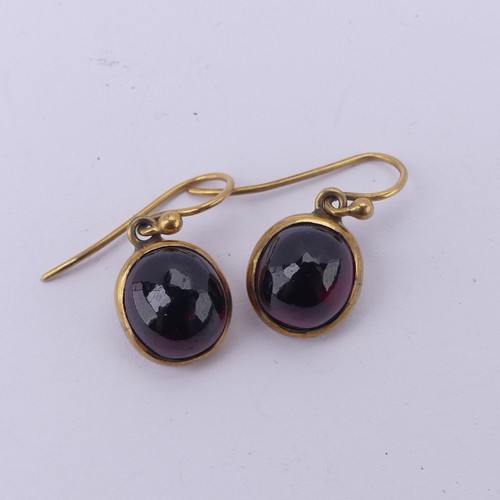 230 - A pair of antique cabochon garnet Earrings, the collet set stones with hook fittings, the stones app... 