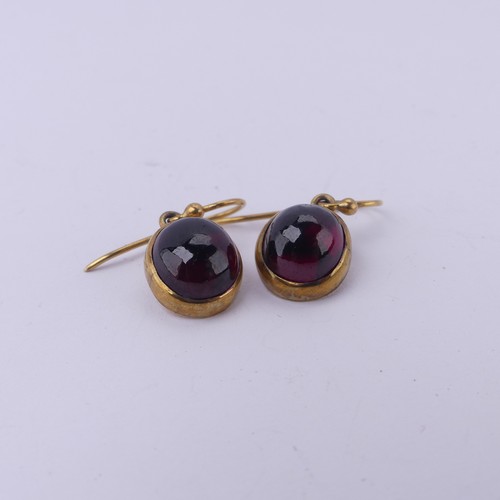 230 - A pair of antique cabochon garnet Earrings, the collet set stones with hook fittings, the stones app... 