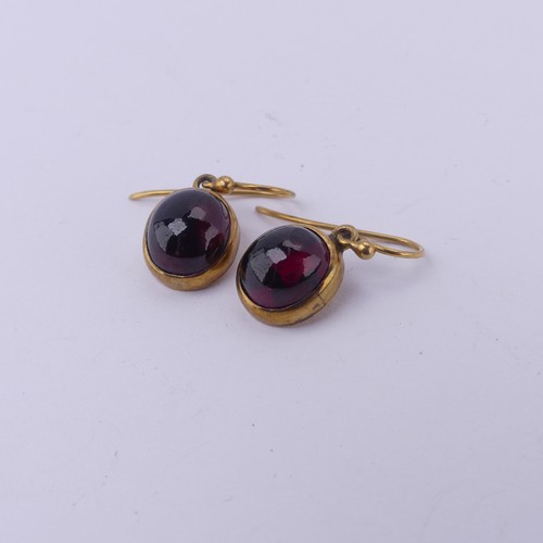 230 - A pair of antique cabochon garnet Earrings, the collet set stones with hook fittings, the stones app... 