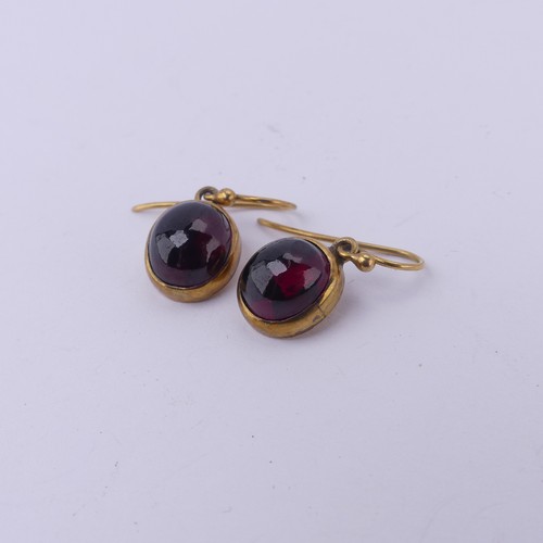 230 - A pair of antique cabochon garnet Earrings, the collet set stones with hook fittings, the stones app... 