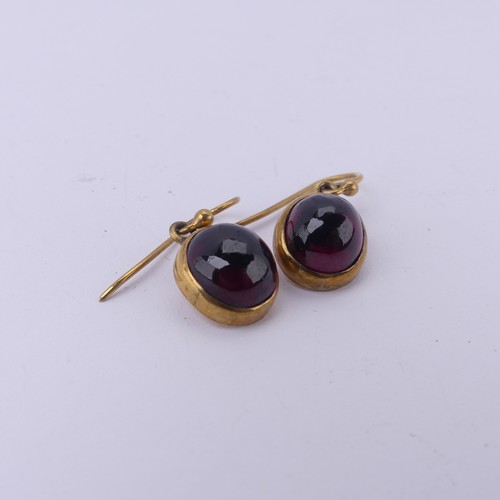 230 - A pair of antique cabochon garnet Earrings, the collet set stones with hook fittings, the stones app... 