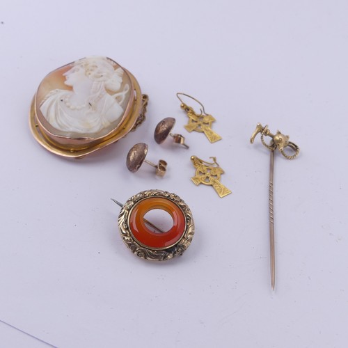 261 - A 9ct yellow gold mounted oval shell Cameo Brooch, together with a stickpin with fox mask and riding... 