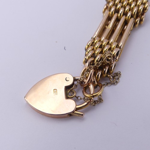 214 - A 9ct yellow gold gatelink Bracelet, with 9ct gold padlock clasp, 16cm long, 18.8g.