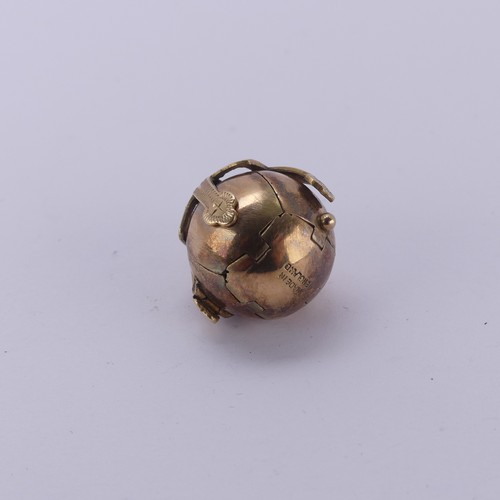 265 - A metamorphic Masonic ball Charm, opening to form a cross engraved with Masonic symbols, 16.5mm diam... 