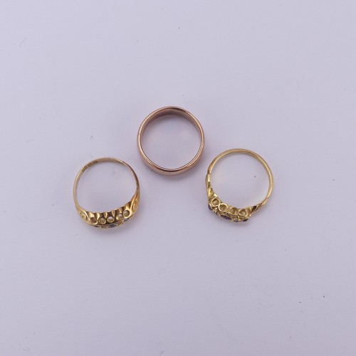 164 - A 9ct rose gold Ring, Size J, 3.2g, together with two small 18ct yellow gold rings, one set sapphire... 