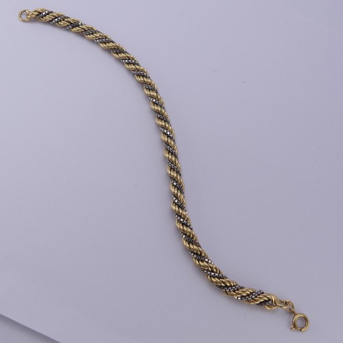 216 - An 18ct yellow and white gold ropetwist Bracelet, with small bolt ring clasp, 21cm long, 21.2g.... 