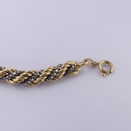 216 - An 18ct yellow and white gold ropetwist Bracelet, with small bolt ring clasp, 21cm long, 21.2g.... 