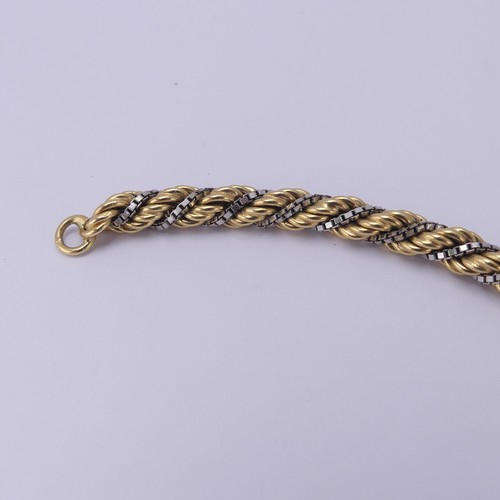 216 - An 18ct yellow and white gold ropetwist Bracelet, with small bolt ring clasp, 21cm long, 21.2g.... 