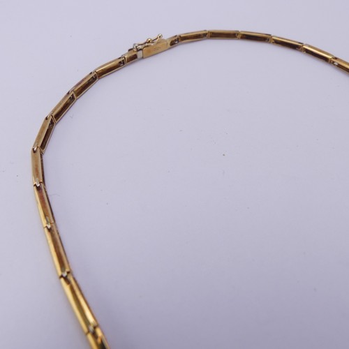 207 - An 18ct yellow gold Necklace, the front collet set with a brilliant cut diamond, the stone approx. ¼... 