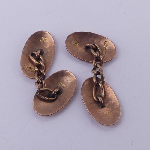 267 - A pair of 9ct rose gold oval Cufflinks, with hammered decoration, 4.3g.