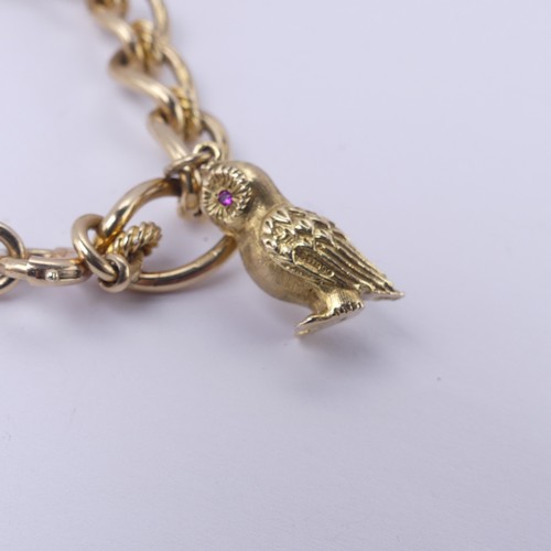 217 - A 9ct yellow gold Charm Bracelet, bolt ring clasp, three 9ct gold charms suspended; Owl, Fob Seal an... 