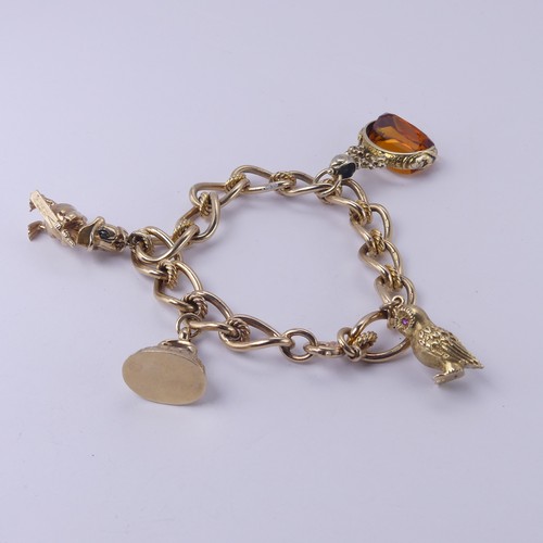 217 - A 9ct yellow gold Charm Bracelet, bolt ring clasp, three 9ct gold charms suspended; Owl, Fob Seal an... 