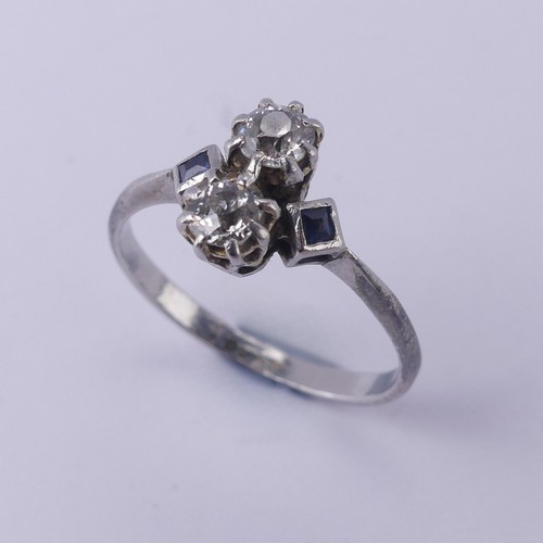 168 - A sapphire and diamond Ring, the central old cut diamonds, each approx. 0.15ct, vertically set in cl... 