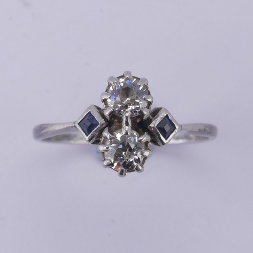 168 - A sapphire and diamond Ring, the central old cut diamonds, each approx. 0.15ct, vertically set in cl... 