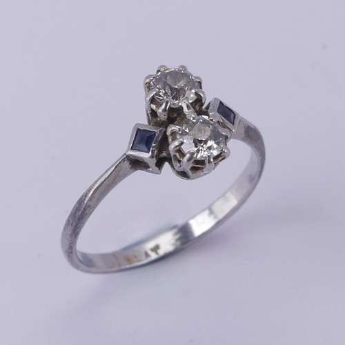 168 - A sapphire and diamond Ring, the central old cut diamonds, each approx. 0.15ct, vertically set in cl... 