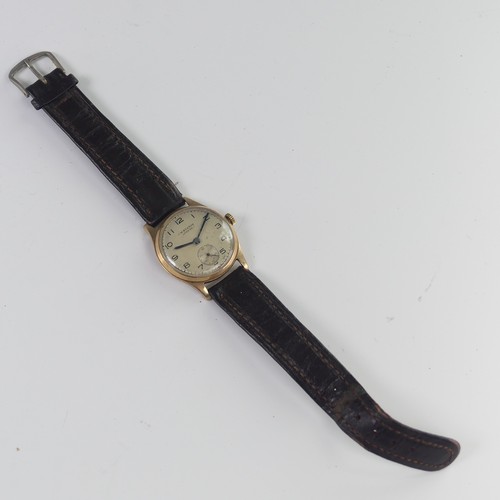 97 - A vintage J.W. Benson 9ct gold Wristwatch, the signed silvered dial with black Arabic numerals and s... 