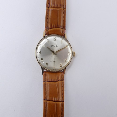 99 - A vintage 9ct gold Roamer Wristwatch, the silvered dial with gilt Arabic numerals, and sweeping subs... 