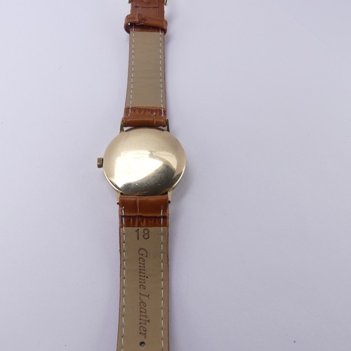 99 - A vintage 9ct gold Roamer Wristwatch, the silvered dial with gilt Arabic numerals, and sweeping subs... 