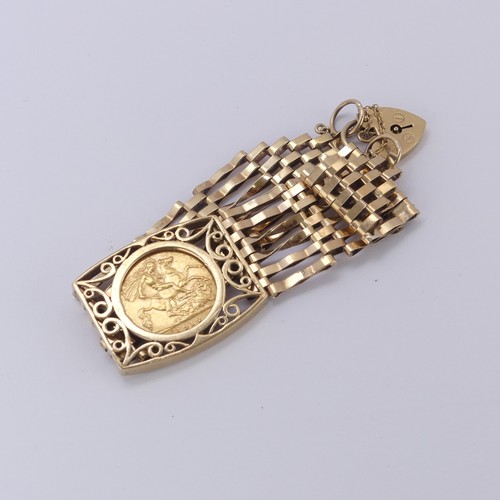 218 - An Edwardian gold Half Sovereign, dated 1910, mounted into a 9ct gold gatelink bracelet with padlock... 