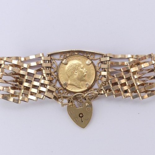 218 - An Edwardian gold Half Sovereign, dated 1910, mounted into a 9ct gold gatelink bracelet with padlock... 