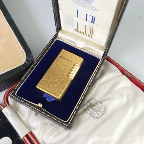 277 - A vintage 'Dunhill 70' gold plated lighter, in fitted presentation case with booklet, together with ... 