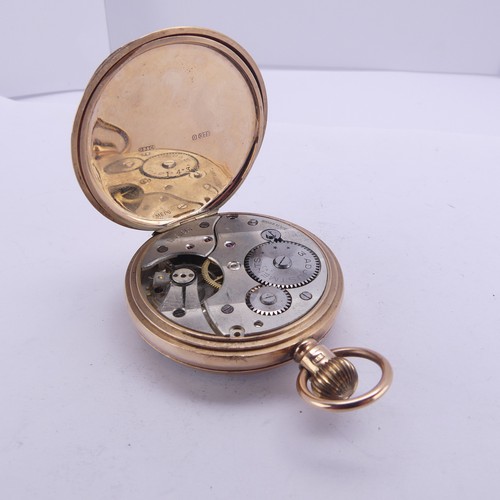 107 - A 9ct gold open face Pocket Watch, the unsigned white enamel dial with Roman Numerals, subsidiary se... 