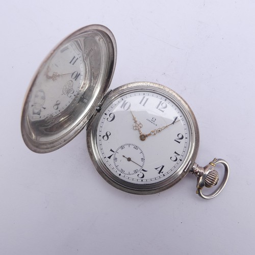 110 - An Omega silver hunter cased Pocket Watch, the signed white enamel dial with Arabic Numerals, subsid... 